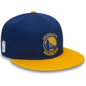 cappellino-snapback-9fifty-blu-e-giallo-con-visiera-piatta-dei-golden-state-warriors-nba-di-new-era