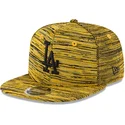 cappello-piatto-giallo-snapback-con-logo-nero-9fifty-engineered-fit-dei-los-angeles-dodgers-mlb-di-new-era
