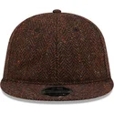 cappelli-piatta-marrone-cinghia-regolabile-9fifty-di-new-era