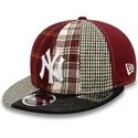 cappellino-piatto-rosso-e-nero-regolabile-9fifty-patch-panel-dei-new-york-yankees-mlb-di-new-era