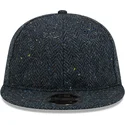 cappello-piatto-blu-navy-regolabile-9fifty-tweed-di-new-era