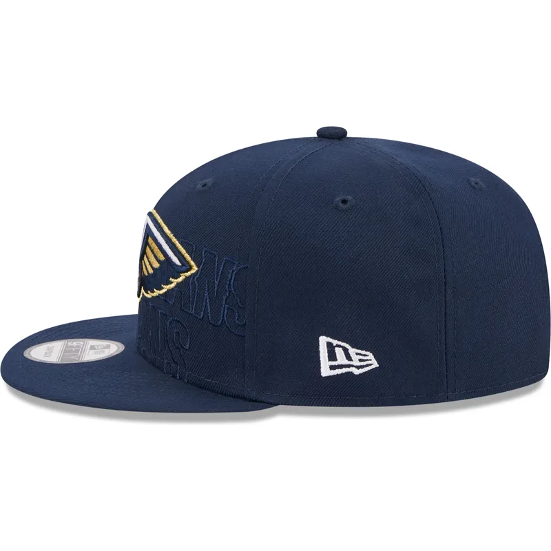 cappello-piatto-blu-navy-snapback-9fifty-draft-edition-2023-dei-new-orleans-pelicans-nba-di-new-era
