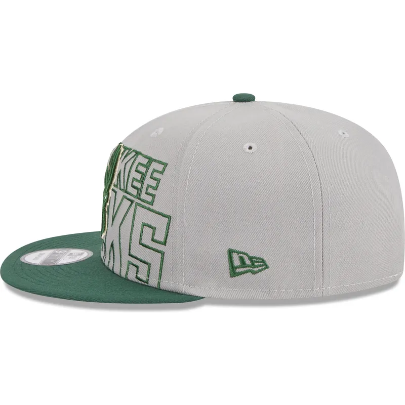 cappello-piatto-grigio-e-verde-snapback-9fifty-draft-edition-2023-di-milwaukee-bucks-nba-di-new-era