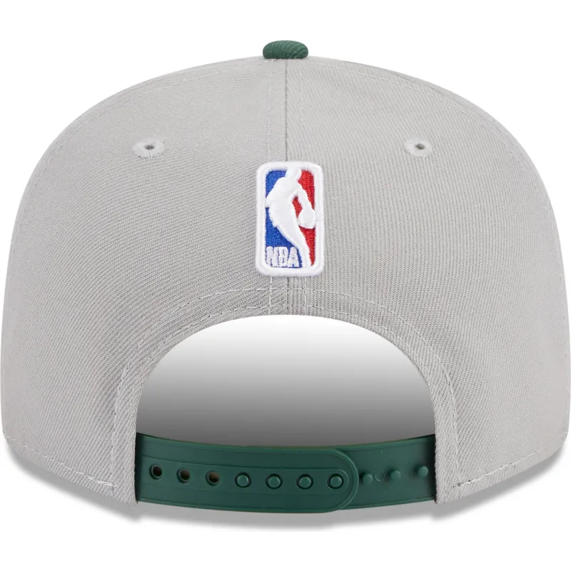 cappello-piatto-grigio-e-verde-snapback-9fifty-draft-edition-2023-di-milwaukee-bucks-nba-di-new-era