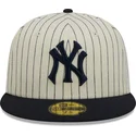 cappelli-piatta-beige-regolato-59fifty-retro-script-dei-new-york-yankees-mlb-di-new-era
