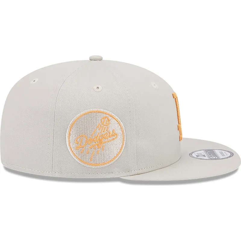 cappelli-piatta-beige-snapback-9fifty-side-patch-dei-los-angeles-dodgers-mlb-di-new-era