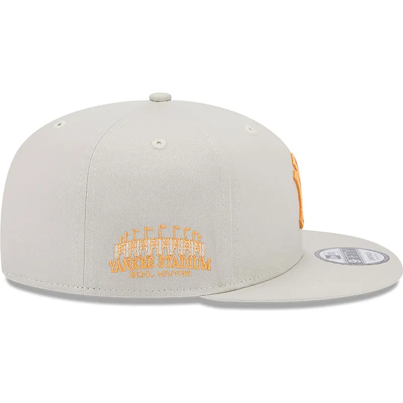 cappelli-piatta-beige-snapback-9fifty-side-patch-dei-new-york-yankees-mlb-di-new-era
