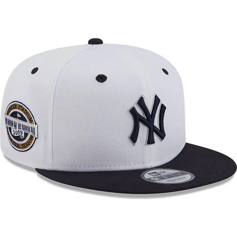 cappello-piatto-bianco-e-blu-navy-snapback-con-logo-blu-navy-9fifty-white-crown-patch-dei-new-york-yankees-mlb-di-new-era