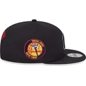 cappello-piatto-blu-navy-snapback-con-logo-blu-navy-9fifty-side-patch-script-dei-new-york-yankees-mlb-di-new-era