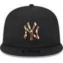 cappello-piatto-nero-snapback-con-logo-marrone-9fifty-seasonal-infill-di-new-york-yankees-mlb-di-new-era