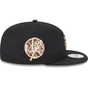 cappello-piatto-nero-snapback-con-logo-marrone-9fifty-seasonal-infill-di-new-york-yankees-mlb-di-new-era