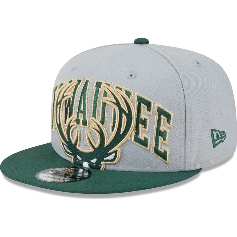 cappelli-piatta-grigio-snapback-9fifty-tip-off-2023-dei-milwaukee-bucks-nba-di-new-era