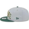 cappelli-piatta-grigio-snapback-9fifty-tip-off-2023-dei-milwaukee-bucks-nba-di-new-era