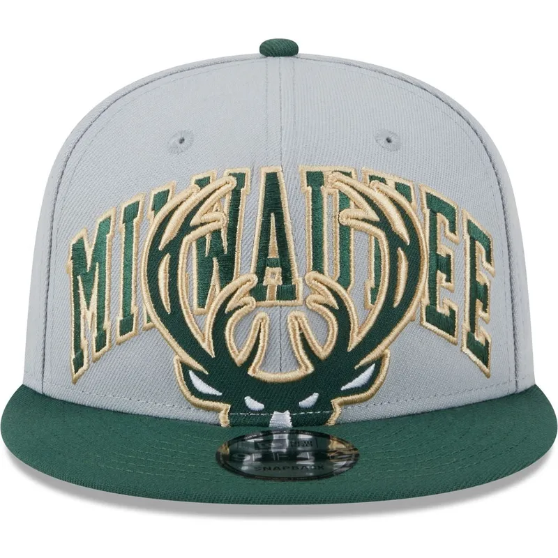 cappelli-piatta-grigio-snapback-9fifty-tip-off-2023-dei-milwaukee-bucks-nba-di-new-era