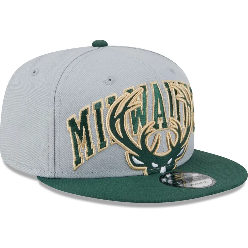 cappelli-piatta-grigio-snapback-9fifty-tip-off-2023-dei-milwaukee-bucks-nba-di-new-era
