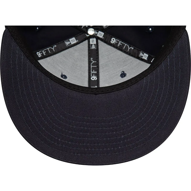 cappellino-snapback-blu-navy-con-visiera-piatta-e-logo-rosso-9fifty-outline-dei-new-york-yankees-mlb-di-new-era