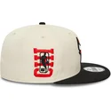 cappellino-piatto-beige-e-nero-snapback-9fifty-logo-dei-chicago-bulls-nba-di-new-era