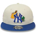 cappello-piatto-bianco-e-blu-snapback-9fifty-floral-dei-new-york-yankees-mlb-di-new-era