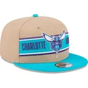 cappello-piatto-marrone-e-blu-snapback-9fifty-draft-2024-di-charlotte-hornets-nba-di-new-era