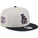 cappello-piatto-beige-e-blu-navy-snapback-9fifty-4th-of-july-dei-los-angeles-dodgers-mlb-di-new-era