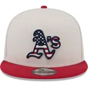 cappello-piatto-beige-e-rosso-snapback-9fifty-4th-of-july-di-oakland-athletics-mlb-di-new-era