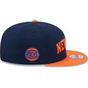 cappello-piatto-blu-marino-e-arancione-snapback-9fifty-statement-dei-new-york-knicks-nba-di-new-era
