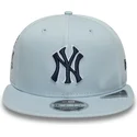 cappello-piatto-blu-snapback-con-logo-blu-marino-9fifty-original-fit-world-series-dei-new-york-yankees-mlb-di-new-era