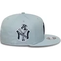 cappello-piatto-blu-snapback-con-logo-blu-navy-9fifty-original-fit-world-series-dei-new-york-yankees-mlb-di-new-era
