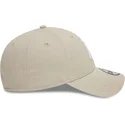 cappellino-beige-con-visiera-curva-regolabile-con-logo-bianco-9forty-league-essential-dei-new-york-yankees-mlb-di-new-era