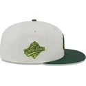 cappello-piatto-beige-e-verde-chiuso-59fifty-clr-dvlp-dei-new-york-yankees-mlb-di-new-era