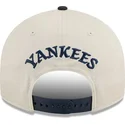 cappellino-curvo-beige-e-blu-navy-snapback-9fifty-retro-crown-scatter-dei-new-york-yankees-mlb-di-new-era