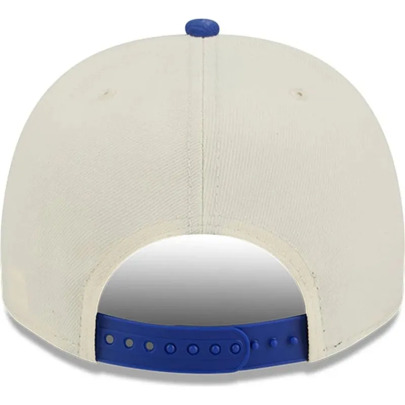 cappellino-visiera-curva-beige-e-blu-snapback-9fifty-a-frame-precurved-hardwood-classics-di-golden-state-warriors-nba-di-new-era