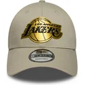 new-era-curved-brim-9forty-metallic-los-angeles-lakers-nba-beige-snapback-cap