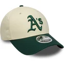 cappellino-curvo-beige-e-verde-snapback-9forty-m-crown-di-oakland-athletics-mlb-di-new-era