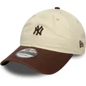 cappellino-curva-beige-e-marrone-regolabile-9twenty-mini-washed-di-new-york-yankees-mlb-di-new-era
