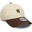 cappellino-curva-beige-e-marrone-regolabile-9twenty-mini-washed-di-new-york-yankees-mlb-di-new-era