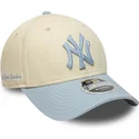 cappellino-curvo-beige-e-blu-snapback-con-logo-blu-9forty-m-crown-side-script-dei-new-york-yankees-mlb-di-new-era
