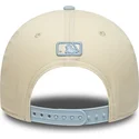 cappellino-curvo-beige-e-blu-snapback-con-logo-blu-9forty-m-crown-side-script-dei-new-york-yankees-mlb-di-new-era