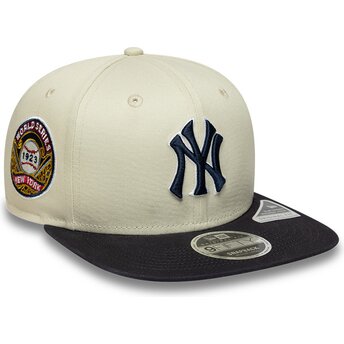 Cappello piatto beige snapback con logo blu marino 9FIFTY Original Fit World Series dei New York Yankees MLB di New Era