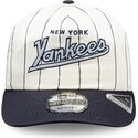 cappello-curvo-blu-marino-snapback-19twenty-pinstripe-dei-new-york-yankees-mlb-di-new-era